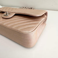 CHANEL Metallic Caviar Chevron Quilted Medium Double Flap Light Gold