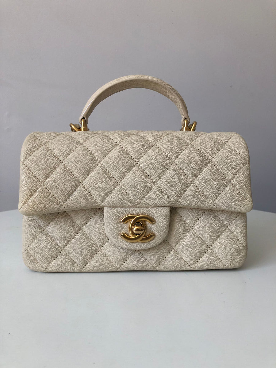 Chanel flap bag with top handle beige hot sale